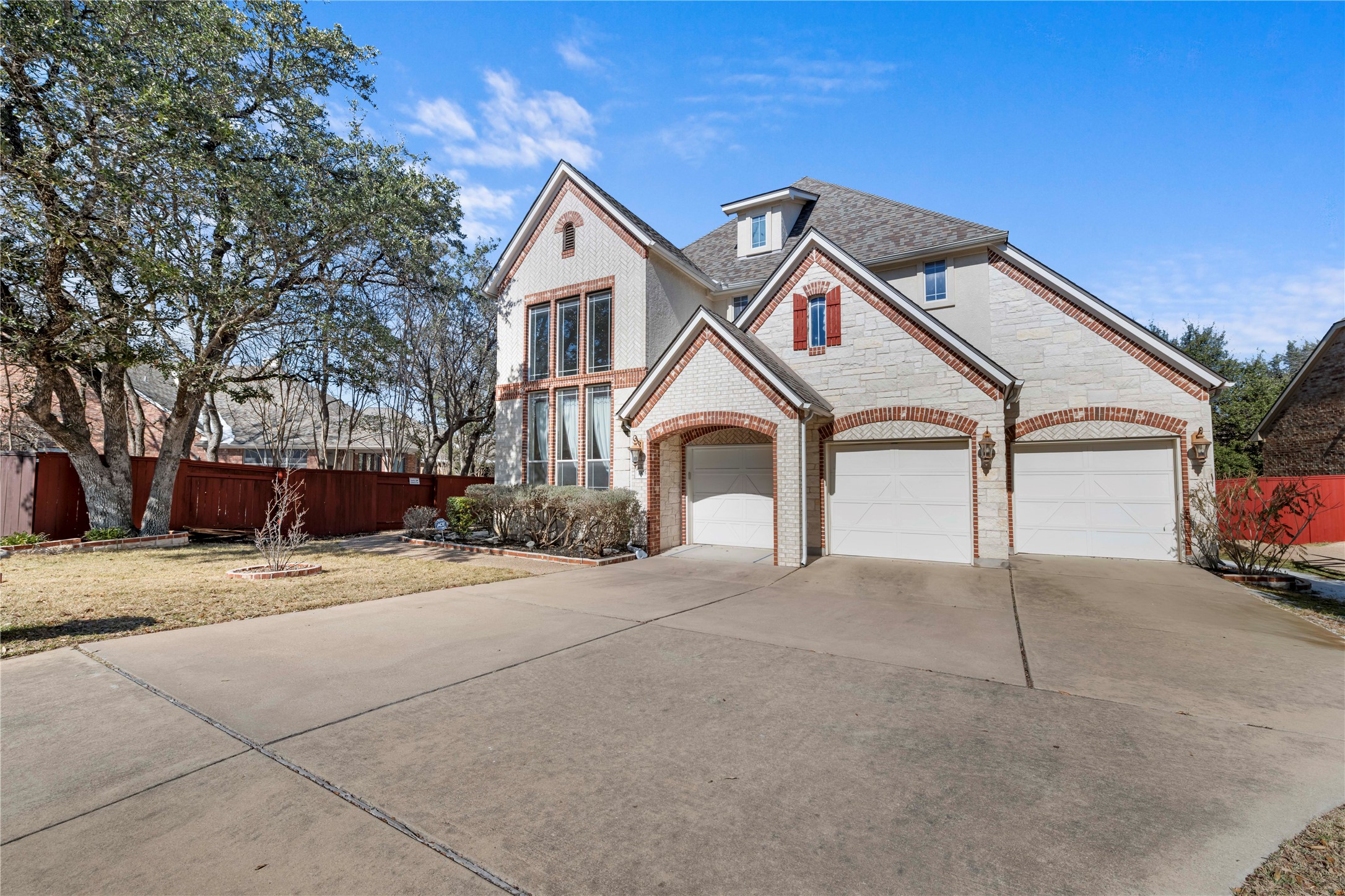 3903 Remington Road Cedar Park, TX 78613 - Photo 30 of 40 a view of a house with a yard and garage
