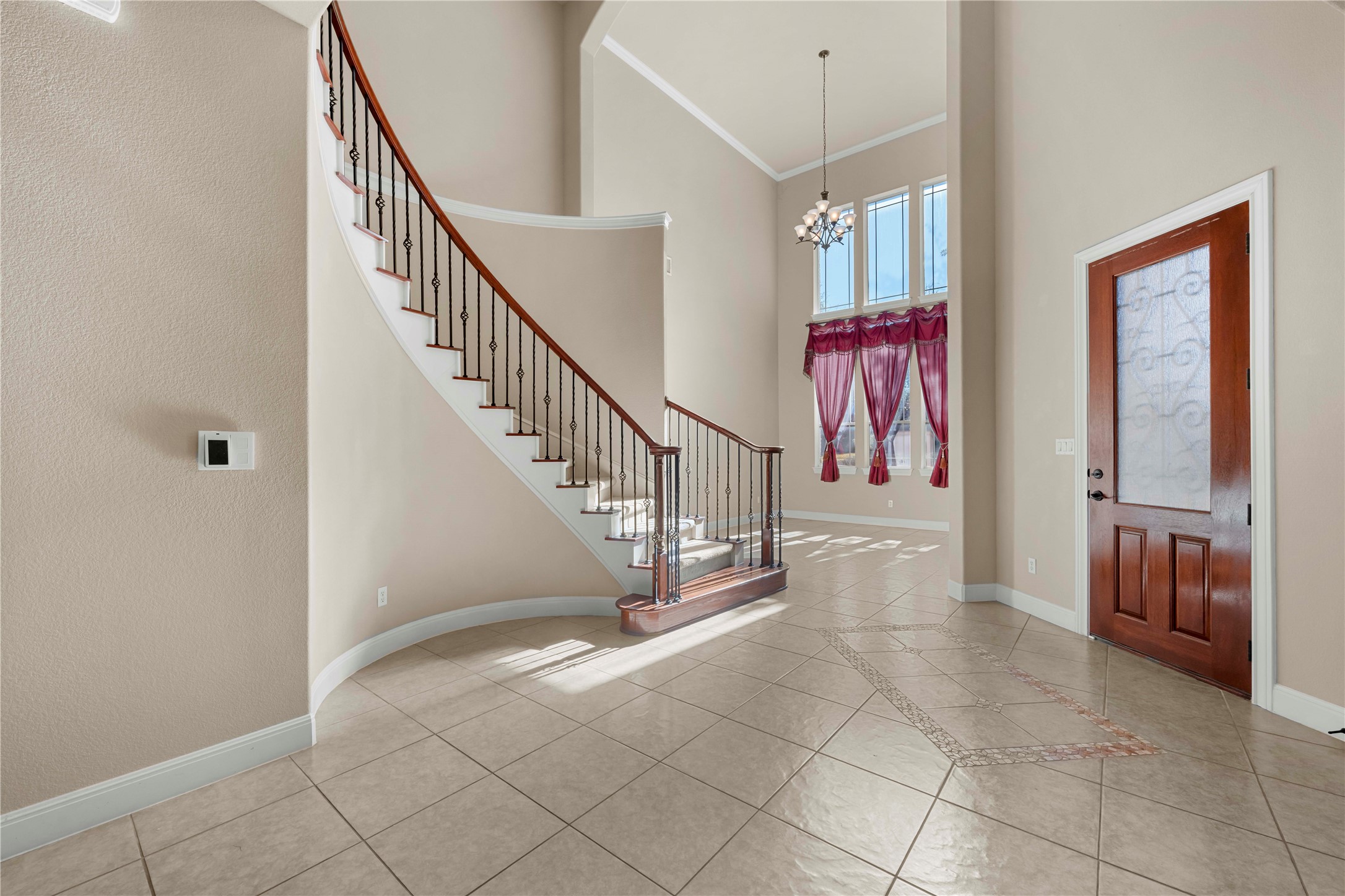 3903 Remington Road Cedar Park, TX 78613 - Photo 4 of 40 a view of entryway and hall with a rug