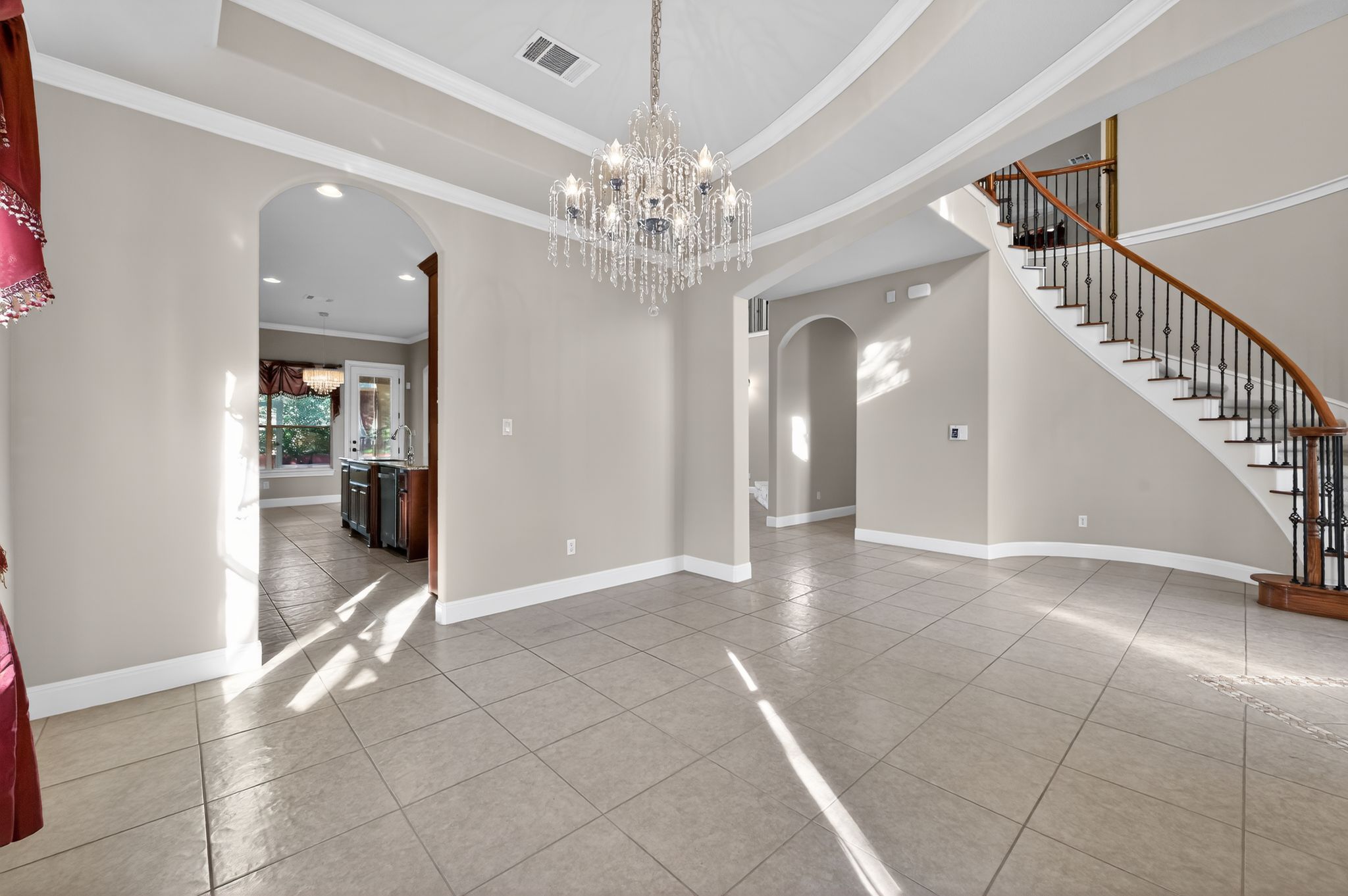 3903 Remington Road Cedar Park, TX 78613 - Photo 7 of 40 a view of a hallway with chandelier and entryway