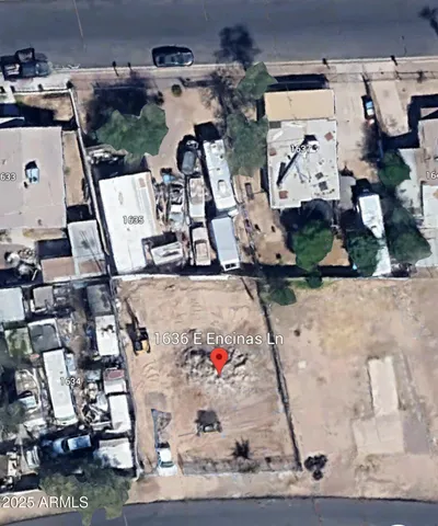 an aerial view of a house with a space