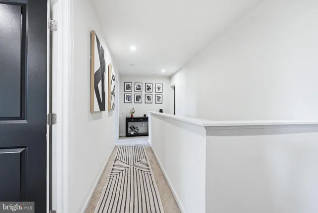 a view of a bedroom with a hallway