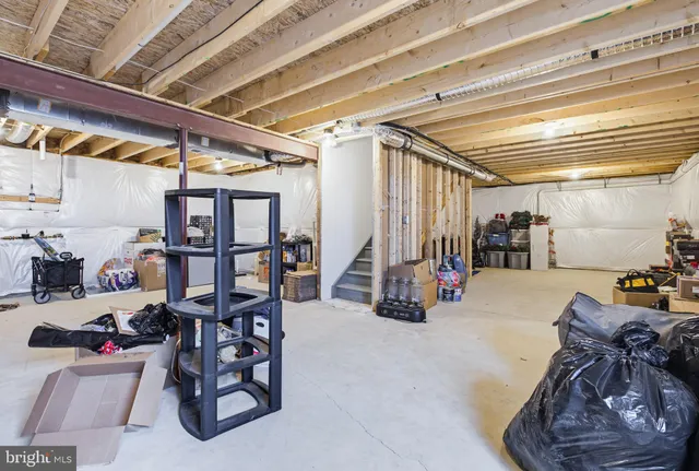 a view of a room with lots of gym equipment