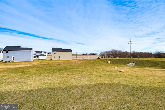 a view of a swimming pool with an ocean view