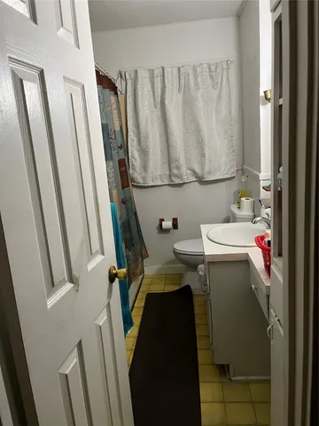 a room with furniture and a window