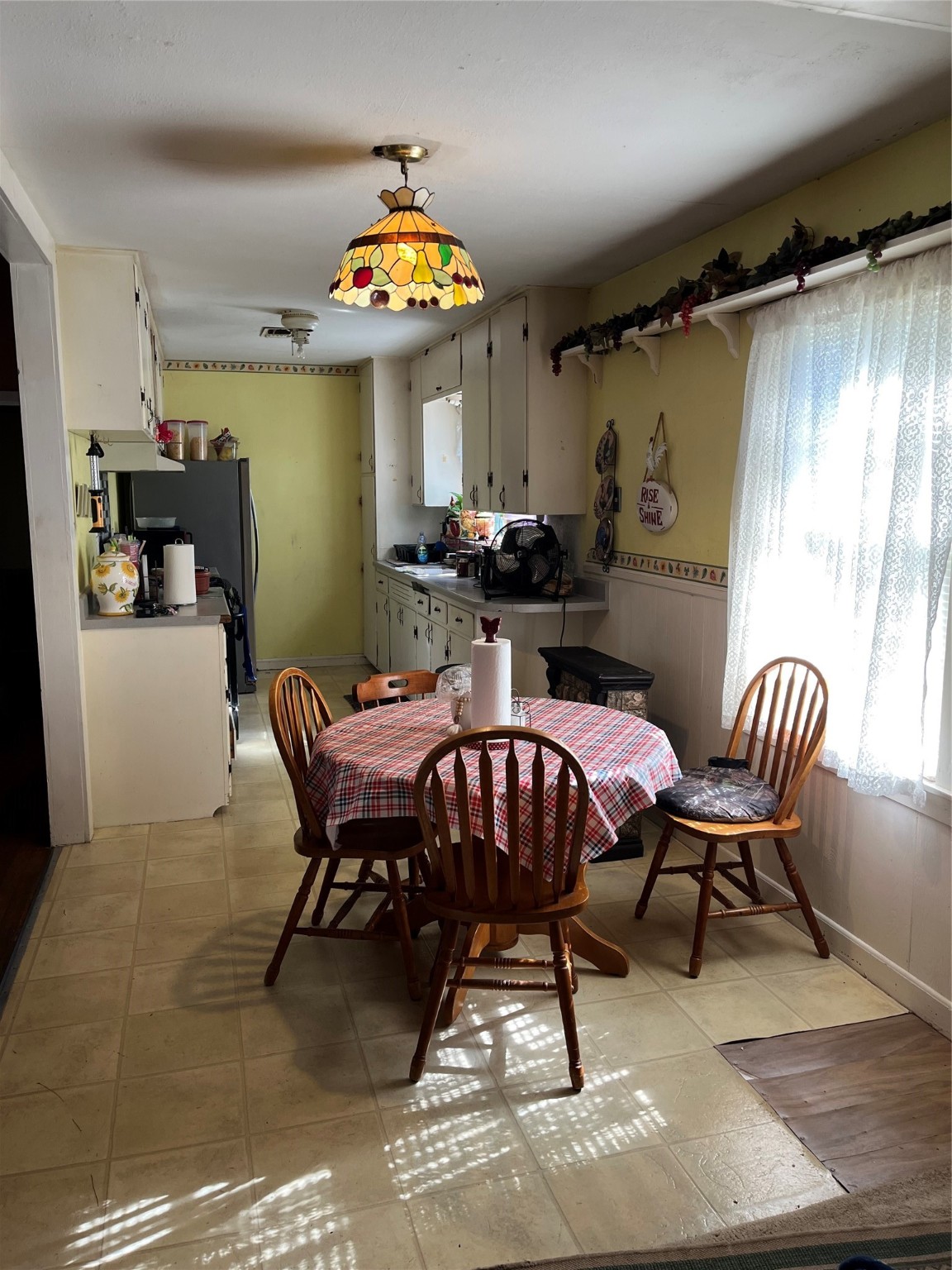 329 Live Oak Street Blessing, TX 77419 - Photo 7 of 14 a view of a dining room with furniture window and outside view