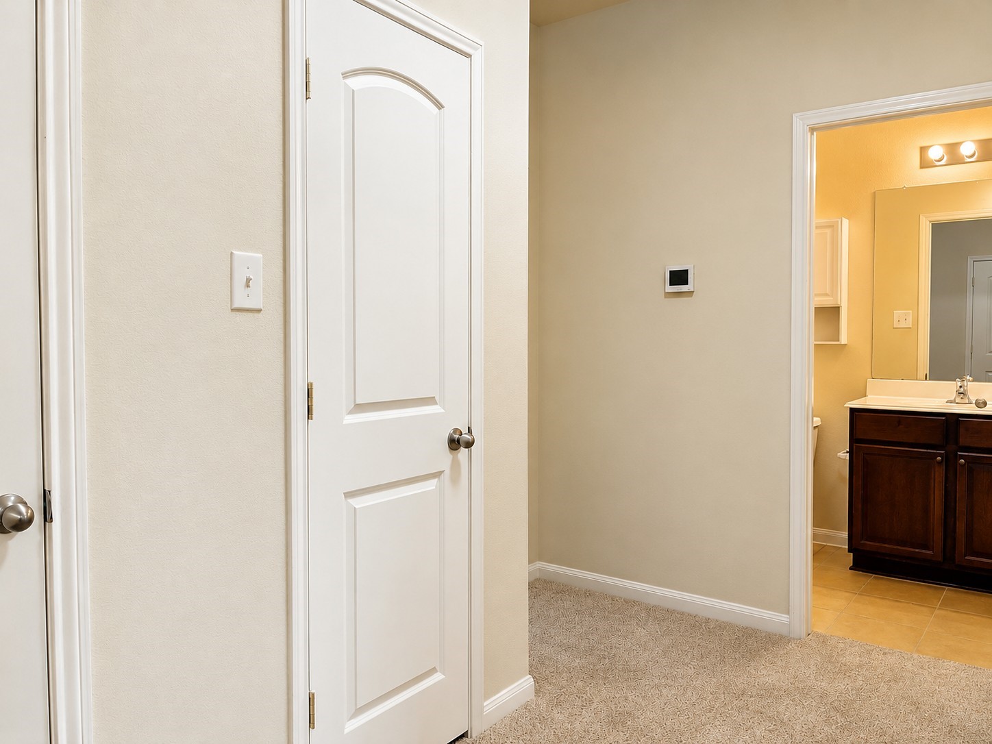 7599 Fettle Lane Conroe, TX 77304 - Photo 9 of 15 a view of a bathroom from the hallway
