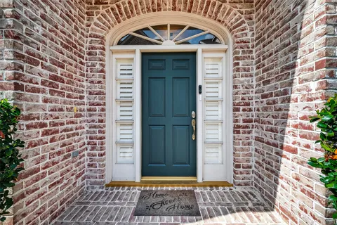 a front view of a house with a door