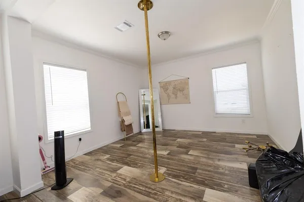 a view of a bathroom with a sink and mirror