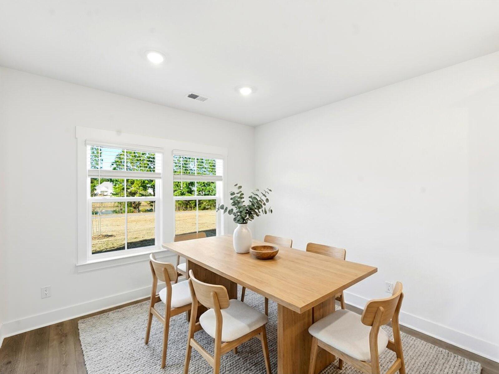 403 Radiant Blue Way Summerville, SC 29486 - Photo 4 of 21 Cane Bay_Conway_Elegant Minimalism_Dinin