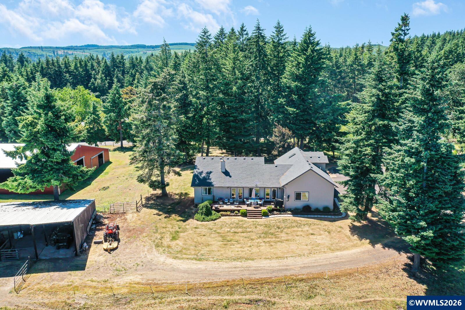 1110 Reuben Boise Road Dallas, OR 97338 - Photo 46 of 49 a view of a house with pool and yard