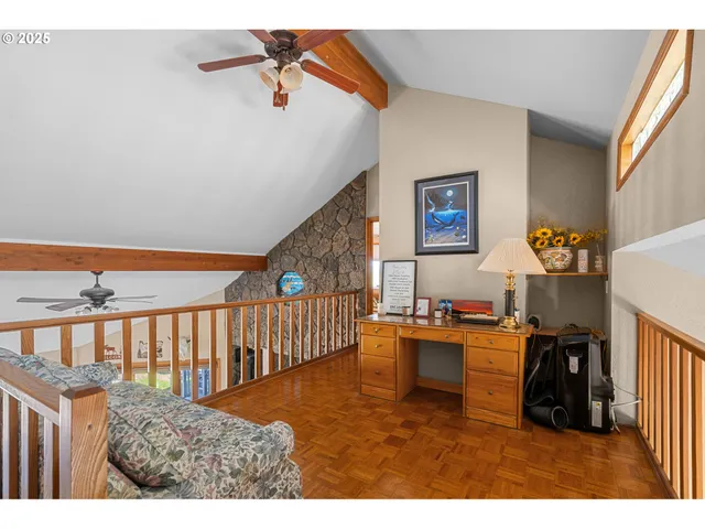 a view of a living room and kitchen