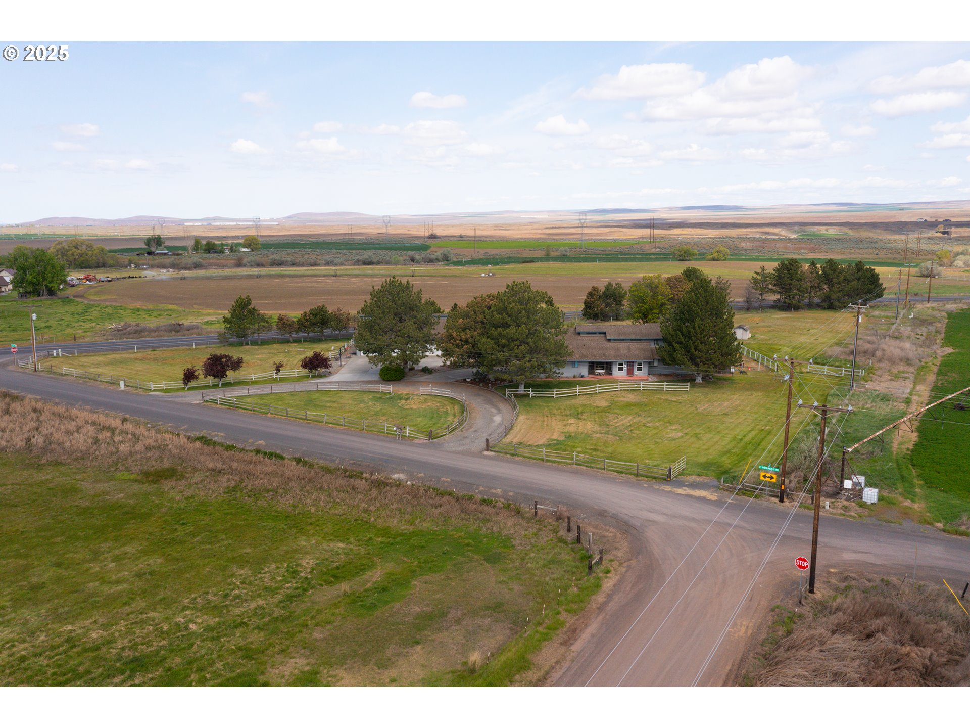 33551 East Progress Road Hermiston, OR 97838 - Photo 3 of 35 a view of a lake with a yard