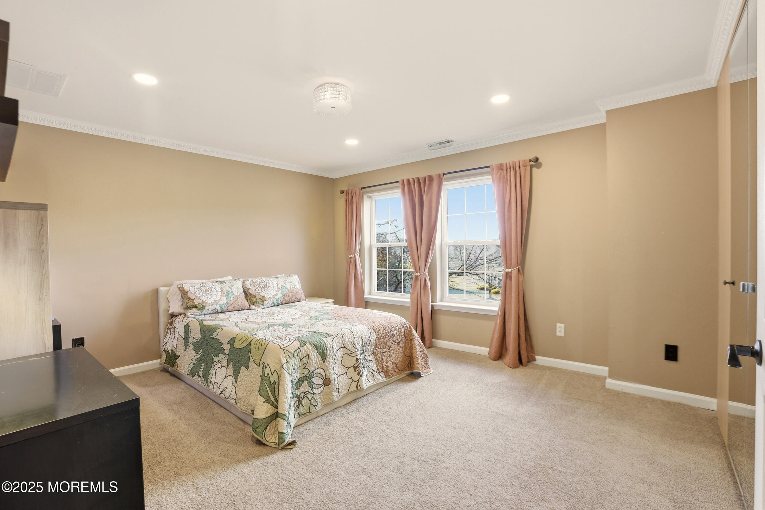 2 Woods Edge Drive Jackson, NJ 08527 - Photo 20 of 43 a bedroom with a bed and a window