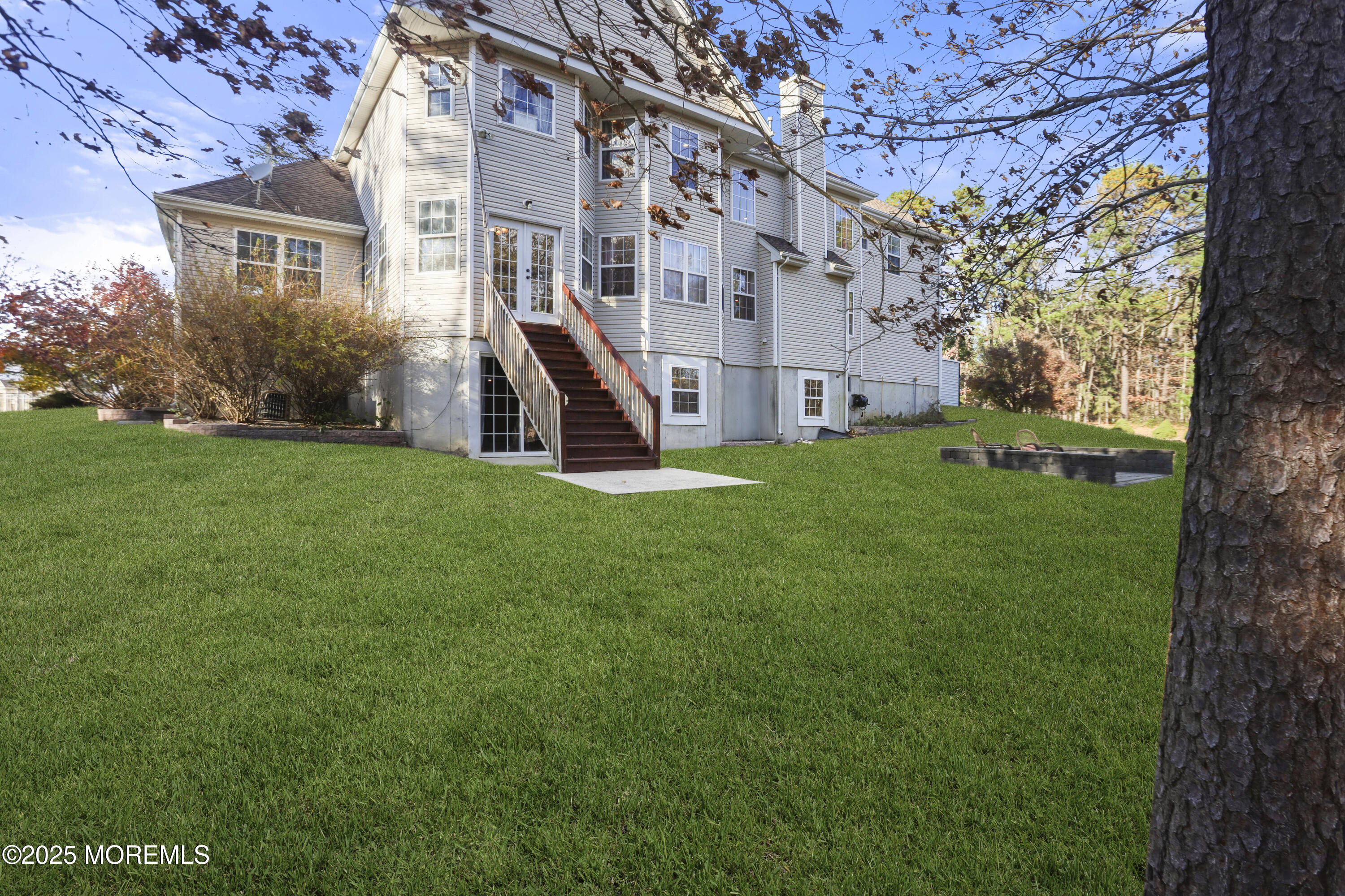 2 Woods Edge Drive Jackson, NJ 08527 - Photo 24 of 43 a view of a big room with a big yard and large tree