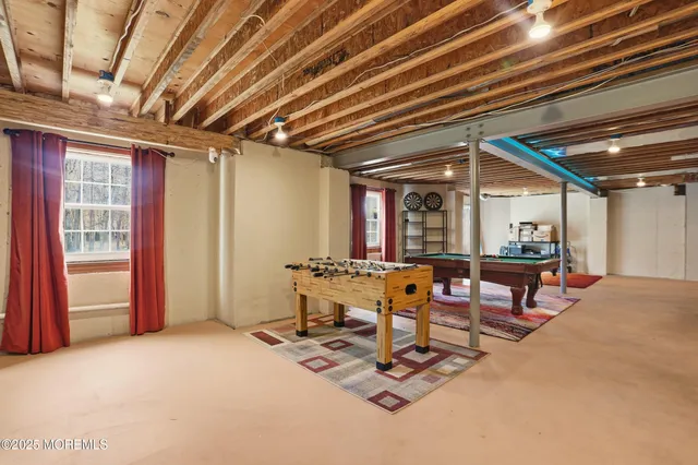 a view of a livingroom with furniture and window