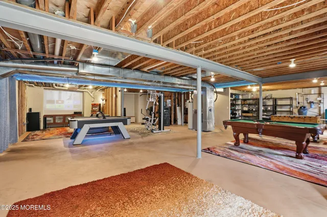 a view of a swimming pool with a bench in patio