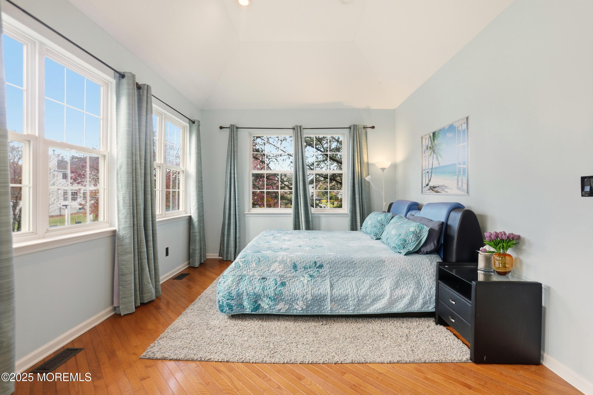 2 Woods Edge Drive Jackson, NJ 08527 - Photo 10 of 43 a bedroom with a bed and wooden floor