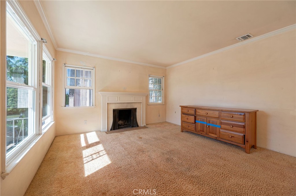 1425 Thompson Avenue Glendale, CA 91201 - Photo 18 of 44 an empty room with furniture and fireplace