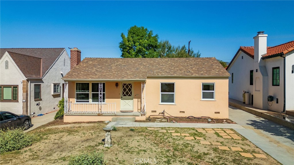 1425 Thompson Avenue Glendale, CA 91201 - Photo 2 of 44 a front view of a house with garden