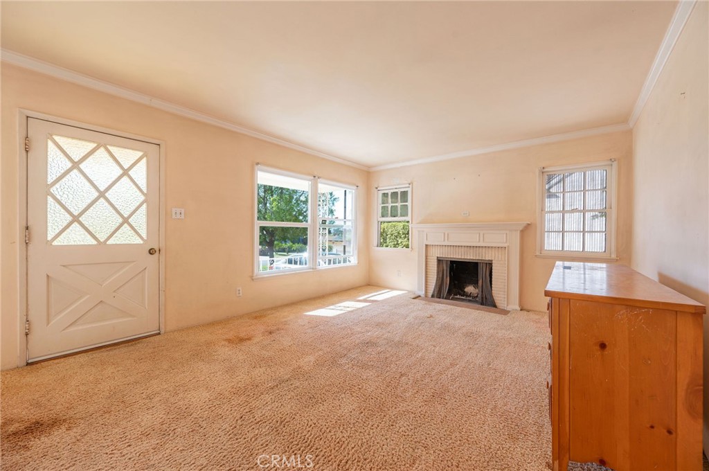 1425 Thompson Avenue Glendale, CA 91201 - Photo 21 of 44 an empty room with windows and fireplace