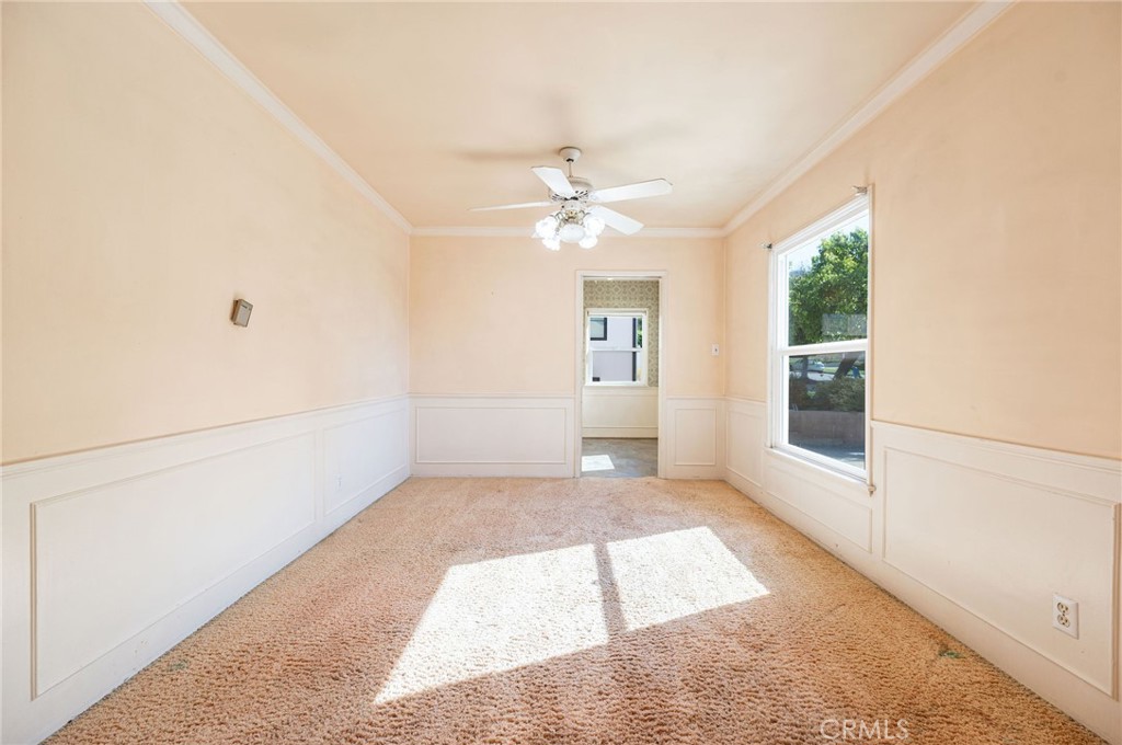 1425 Thompson Avenue Glendale, CA 91201 - Photo 23 of 44 an empty room with chandelier fan and windows
