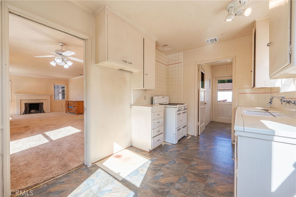 1425 Thompson Avenue Glendale, CA 91201 - Photo 28 of 44 a view of a kitchen cabinets and a livingroom