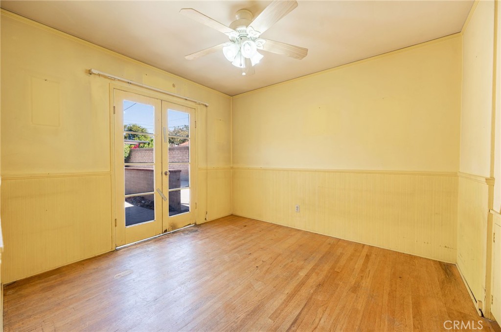 1425 Thompson Avenue Glendale, CA 91201 - Photo 31 of 44 an empty room with wooden floor and a ceiling fan