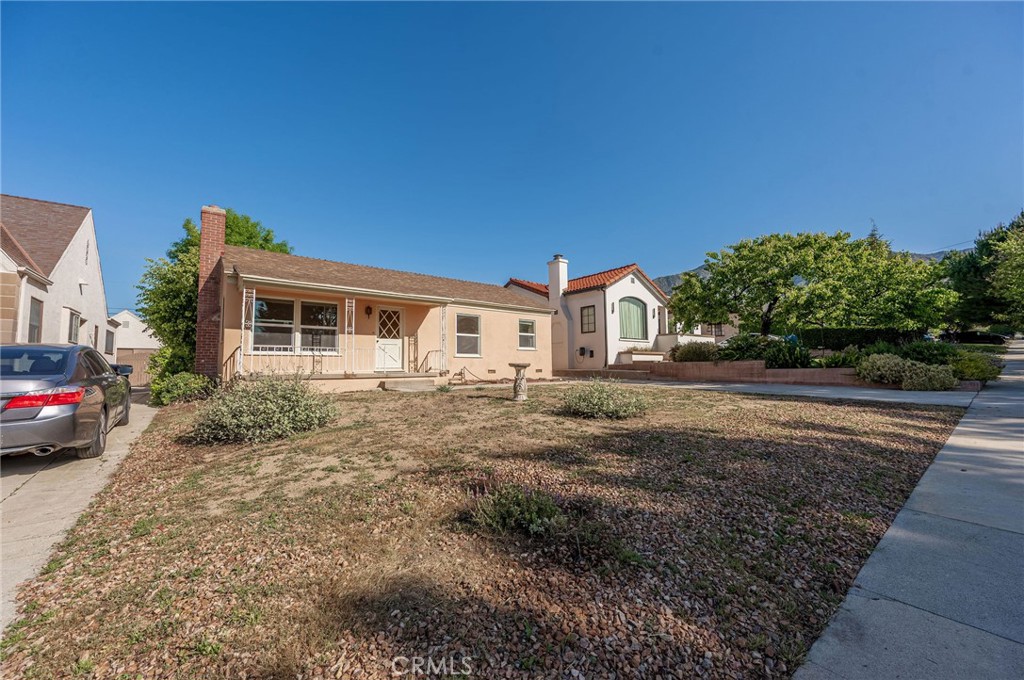 1425 Thompson Avenue Glendale, CA 91201 - Photo 8 of 44 a view of a house with a backyard