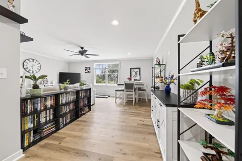 a view of a living room and dining room
