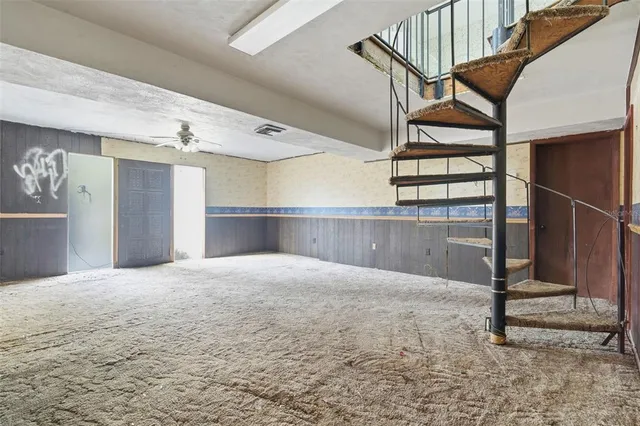 a kitchen with stainless steel appliances granite countertop a sink and cabinets