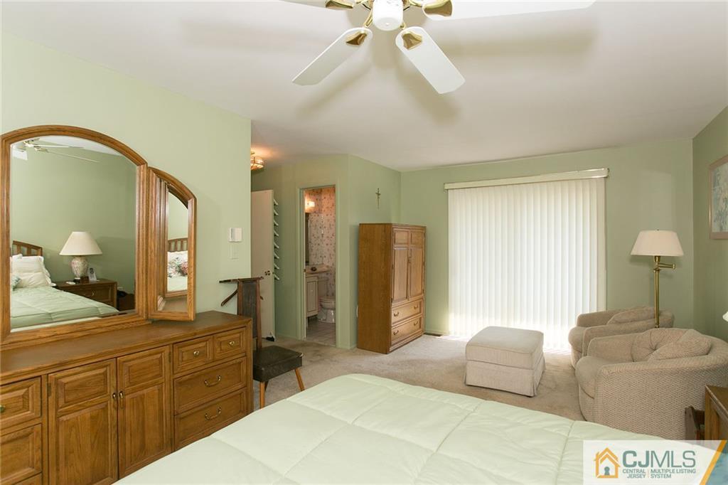 154 Westgate Drive Edison, NJ 08820 - Photo 13 of 19 a bathroom with a double vanity sink and a mirror