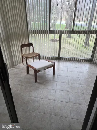 a view of a terrace with outdoor seating