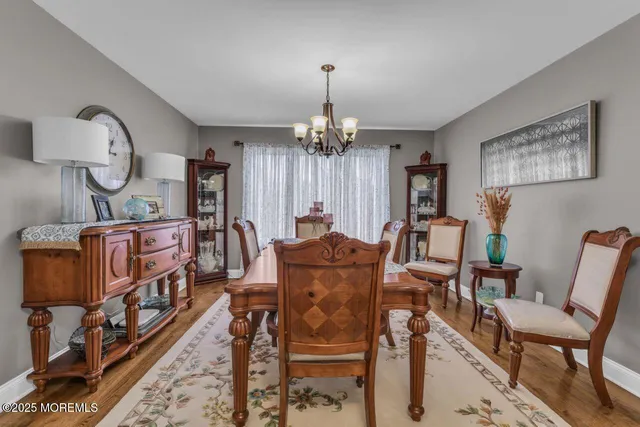 a view of a dining room with furniture