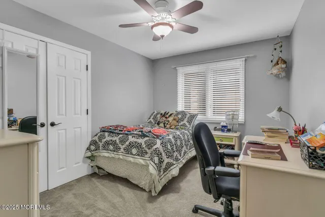 a bathroom with a sink vanity and a mirror