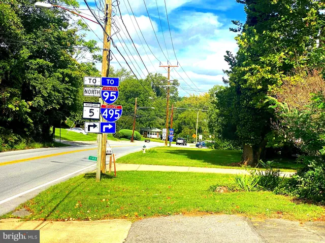 a front view of a building with garden