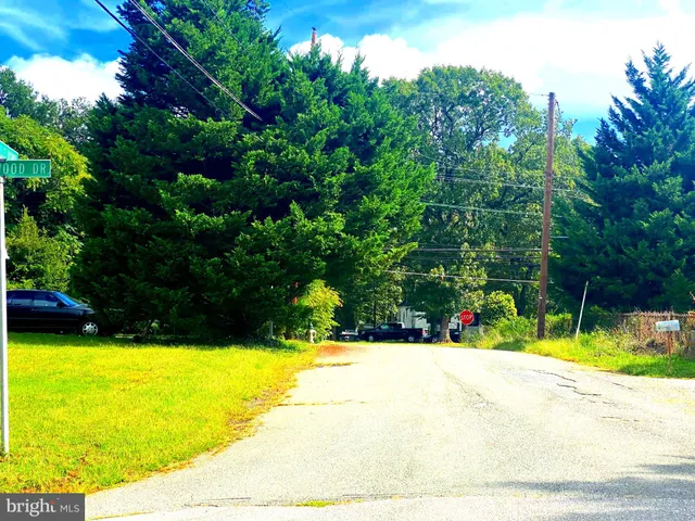 a view of swimming pool with an outdoor space and seating area