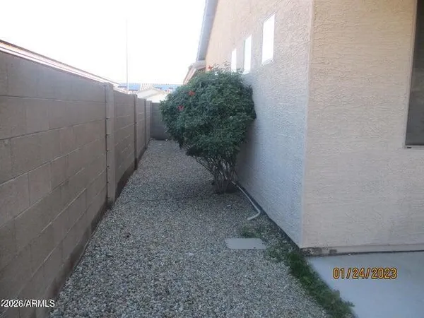 a view of a pathway both side of building