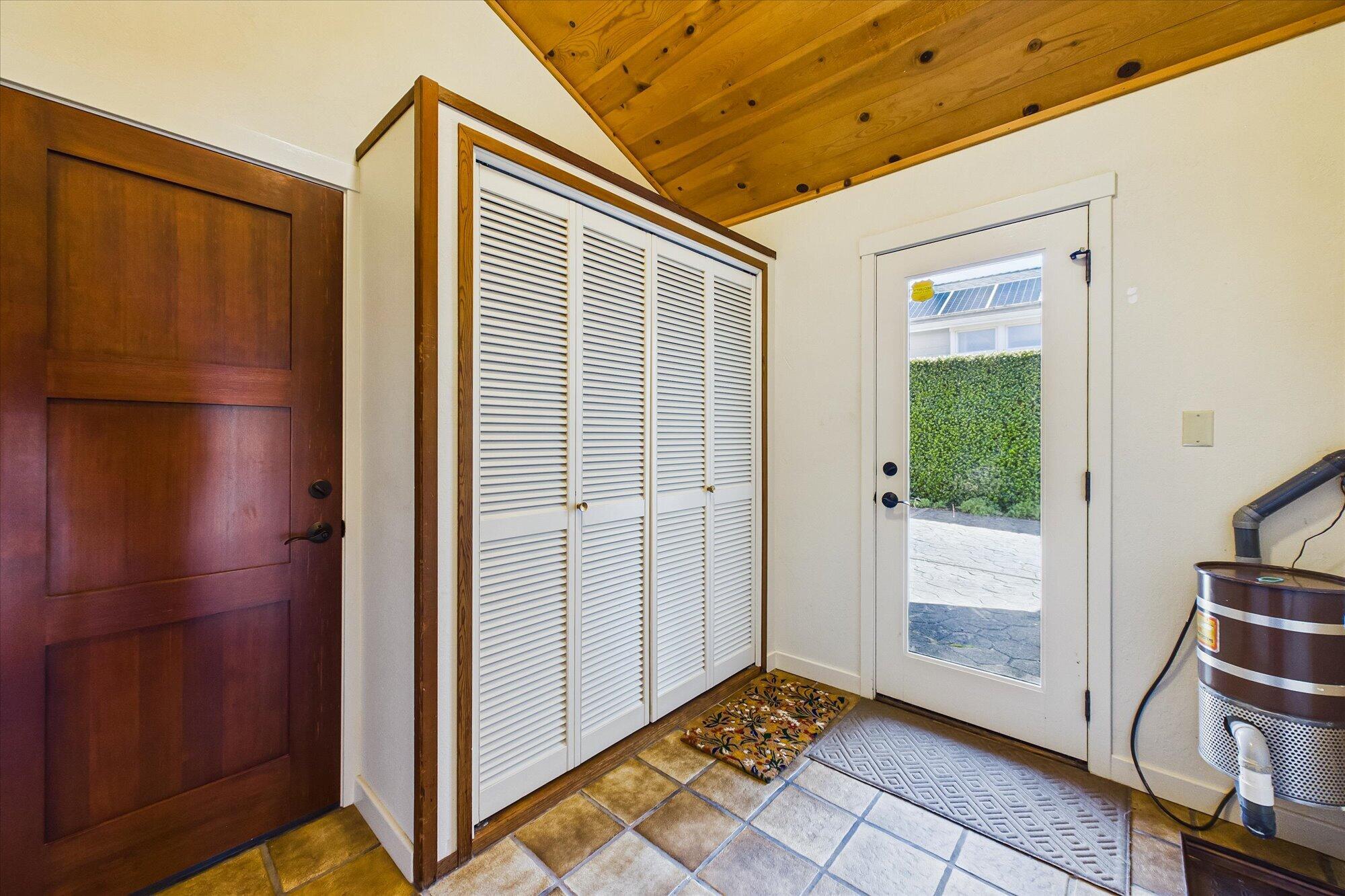 730 Edwards Street Trinidad, CA 95570 - Photo 48 of 73 Mud room closet -entry from driveway