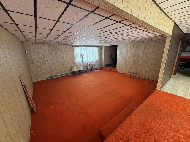 a view of a room with windows