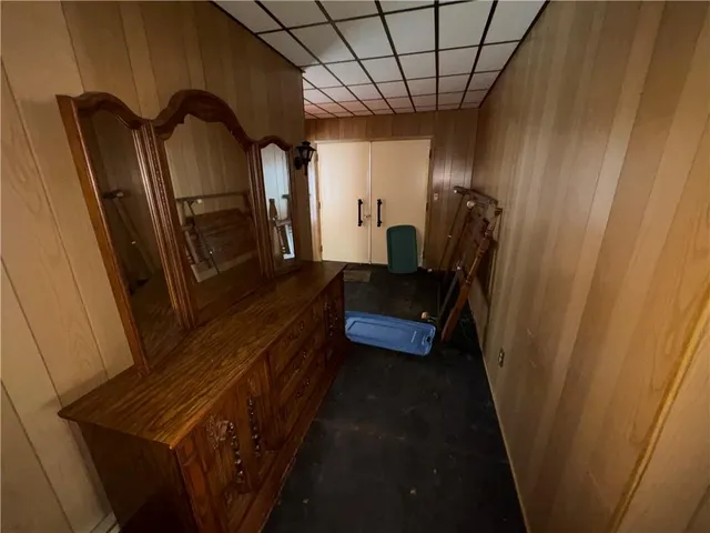 a view of hallway with furniture