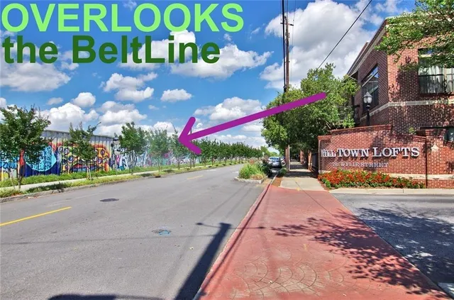 a view of a street with cars