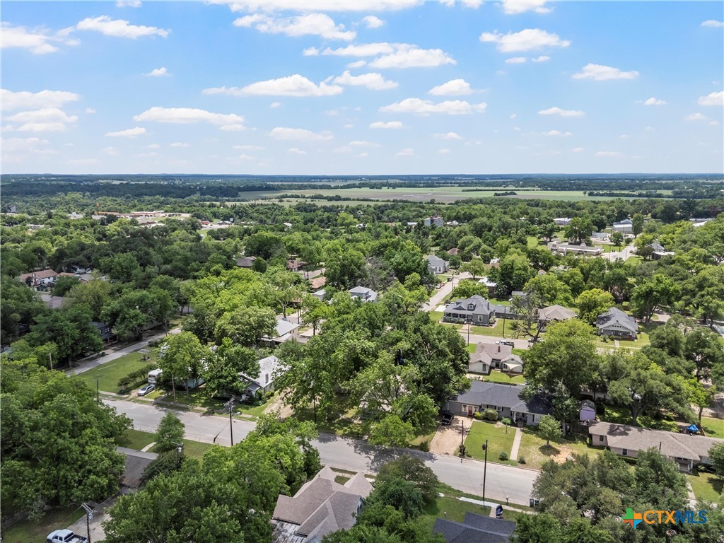 407 East 7th Street Cameron, TX 76520 - Photo 37 of 43 an aerial view of a houses with a lake view