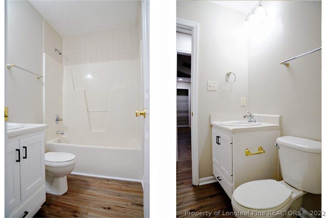 2940 Bakers Mill Road Fayetteville, NC 28306 - Photo 28 of 46 a white toilet sitting next to a bathroom sink
