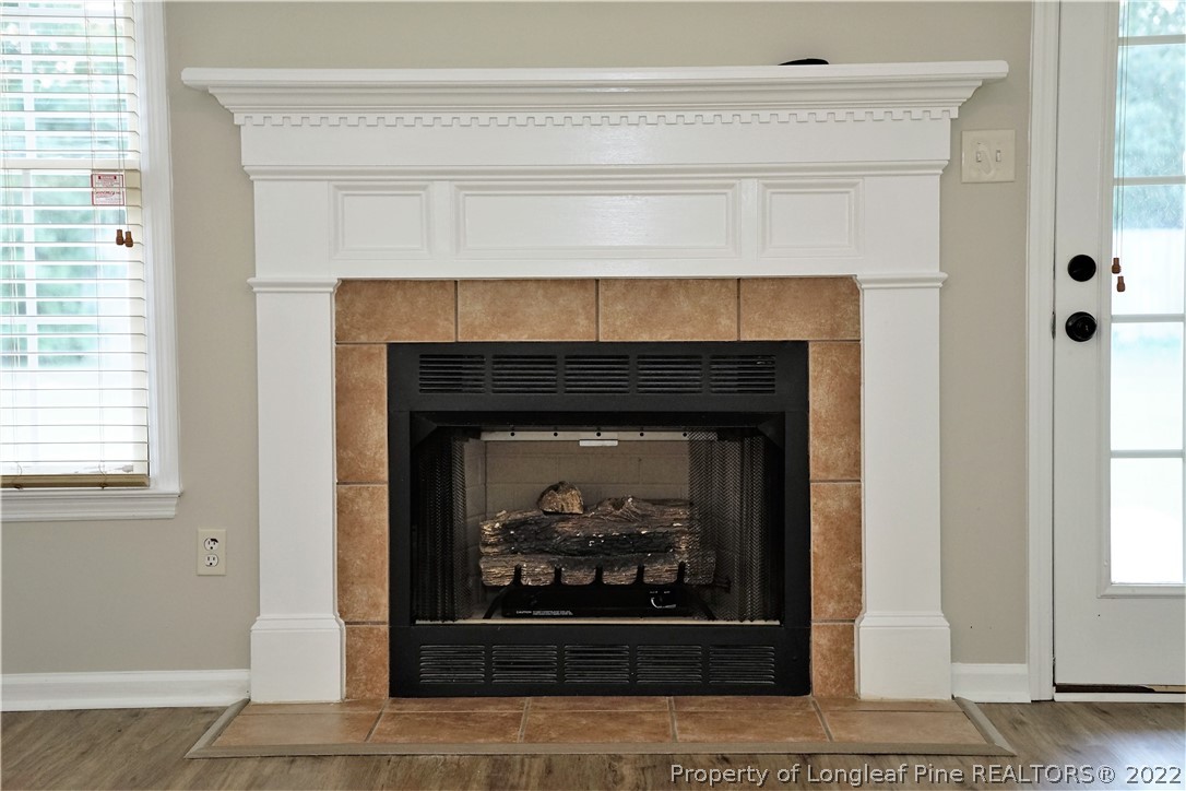 2940 Bakers Mill Road Fayetteville, NC 28306 - Photo 30 of 46 a living room with a fireplace