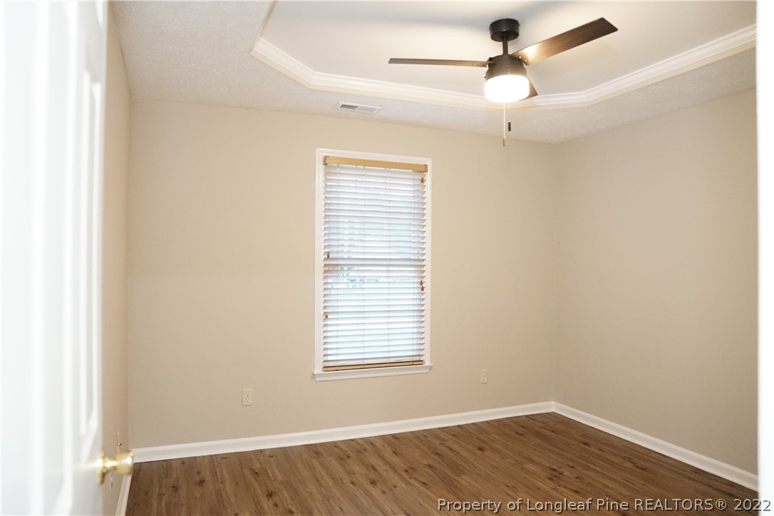 2940 Bakers Mill Road Fayetteville, NC 28306 - Photo 36 of 46 an empty room with a window and a fan