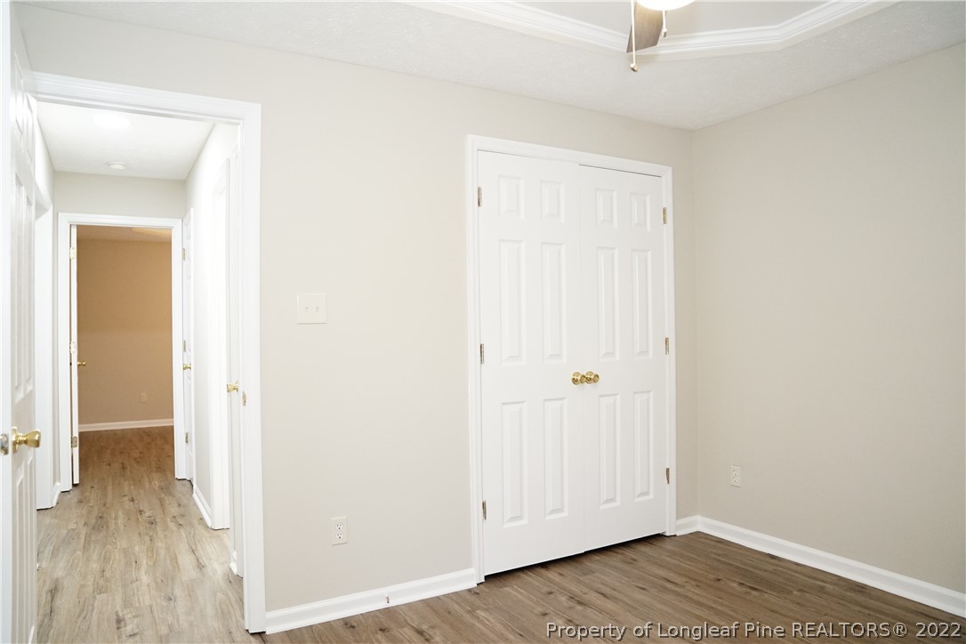 2940 Bakers Mill Road Fayetteville, NC 28306 - Photo 39 of 46 a view of a room with wooden floor
