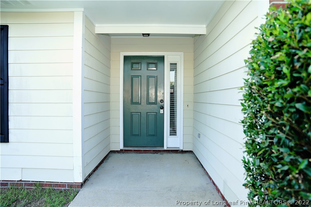 2940 Bakers Mill Road Fayetteville, NC 28306 - Photo 4 of 46 a view of front door of a house
