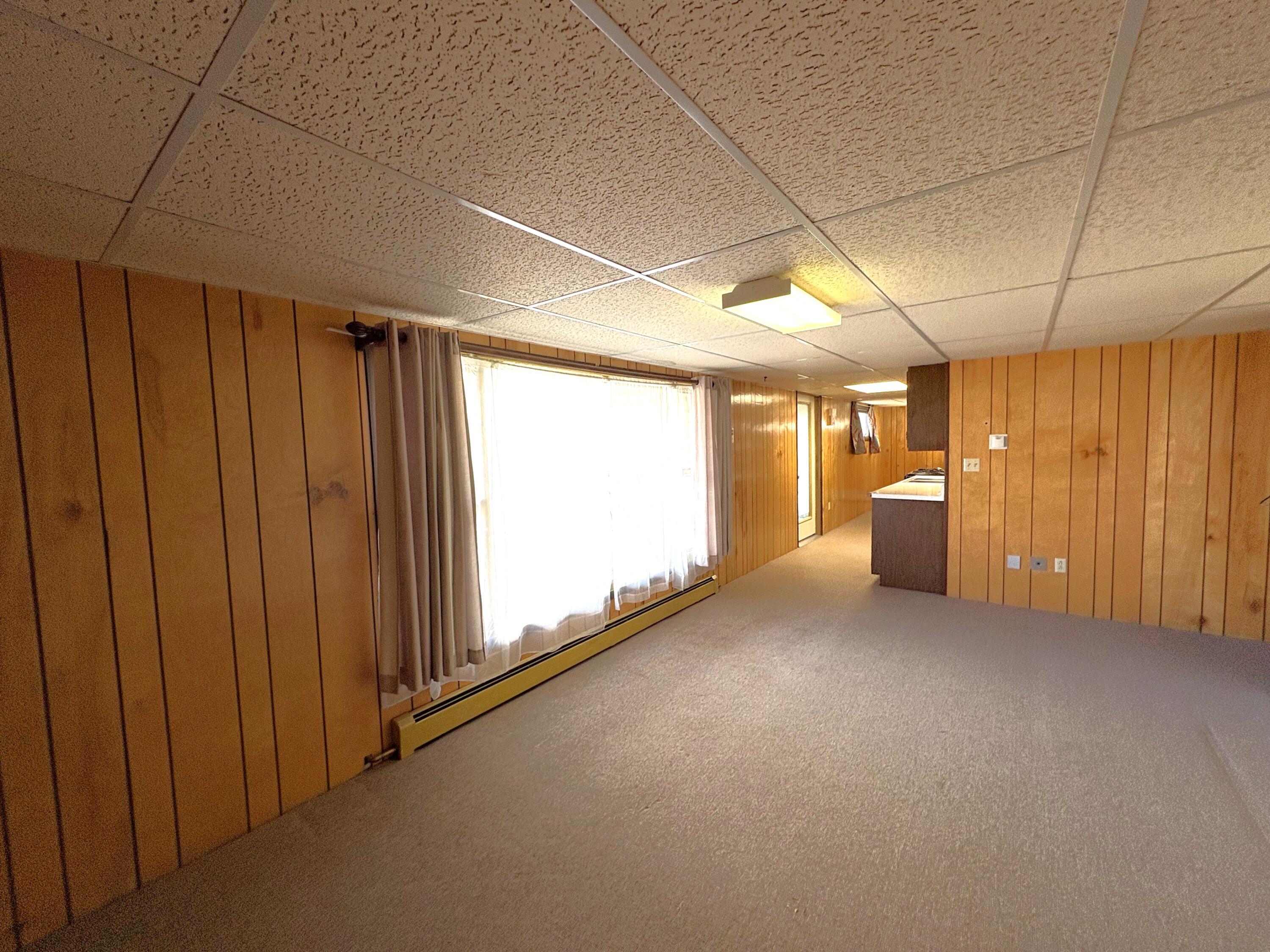 555 South Main Street Buffalo, WY 82834 - Photo 24 of 44 17 Lower Level Living Room
