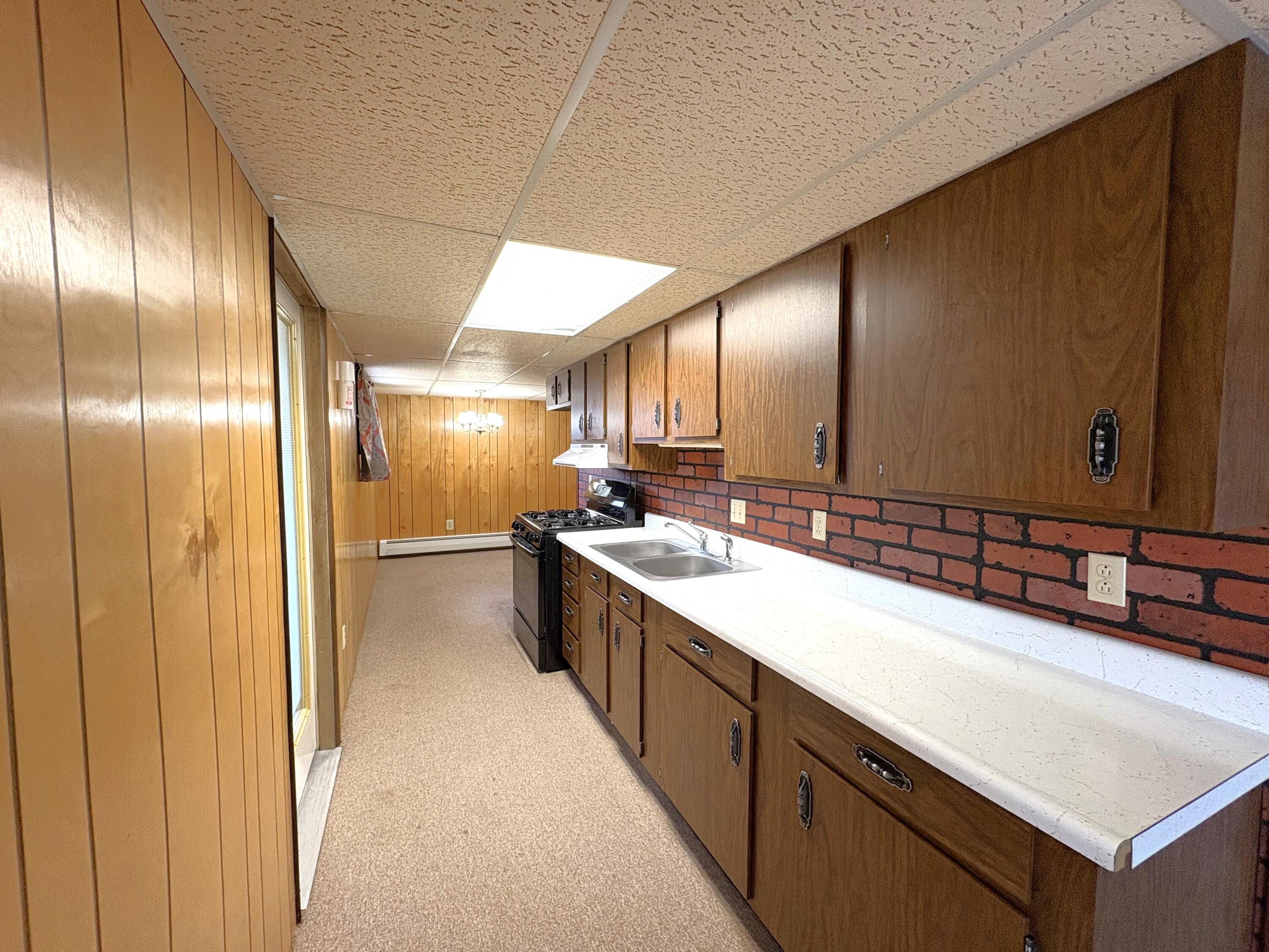 555 South Main Street Buffalo, WY 82834 - Photo 26 of 44 19 Lower Level Kitchen