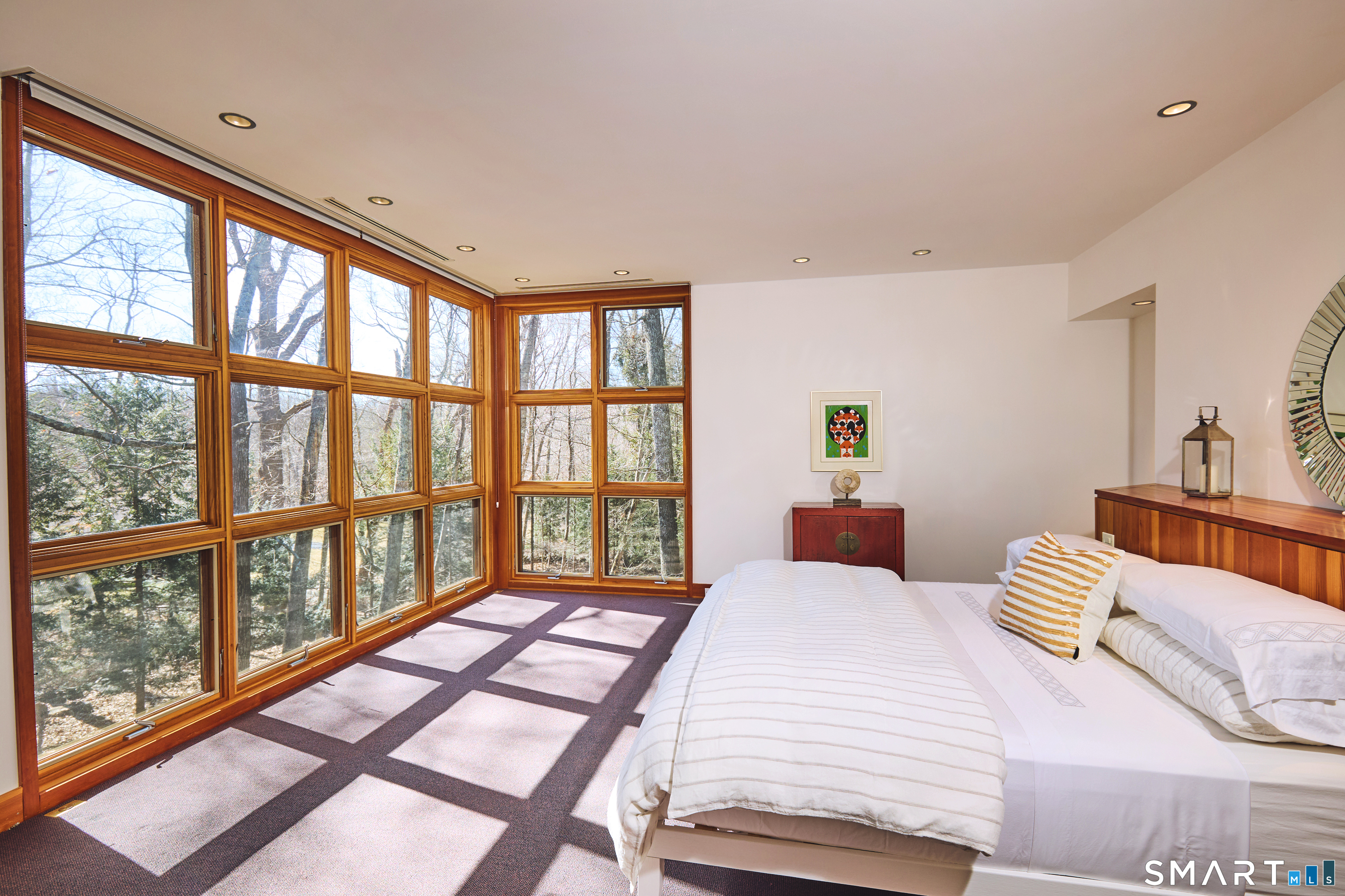 14 Codfish Lane Weston, CT 06883 - Photo 9 of 23 a bedroom with a bed and a large window